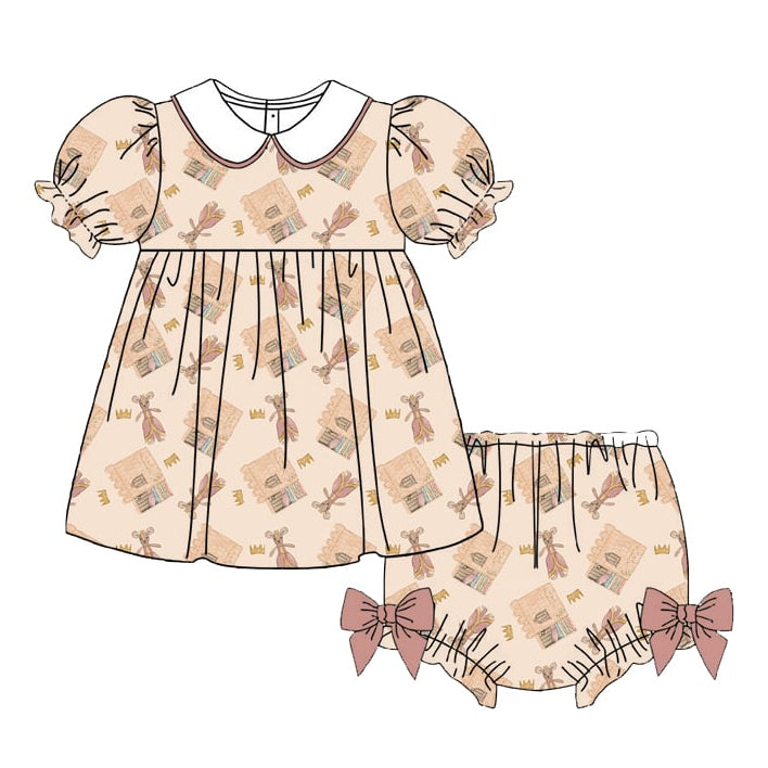 Children's dress with patterned design on a white background